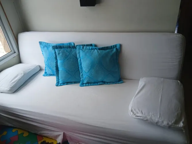 Sofá cama com capa