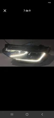 Farol lado esquerdo traker premier