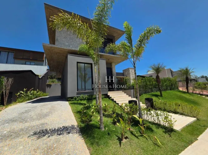 Casa com 4 dormitórios à venda, 455 m² por R$ 6.980.000,00 - Condomínio Villa Dos Pinheiro