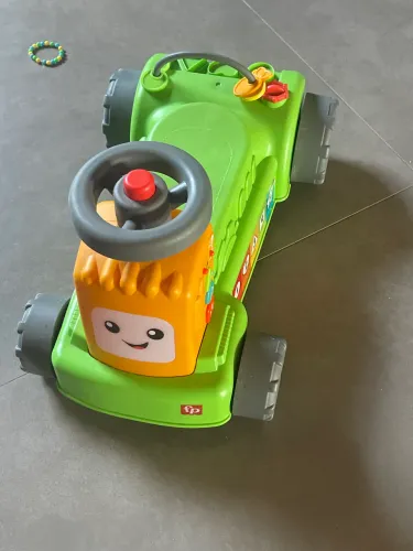 Trator fisher price 4 em 1.