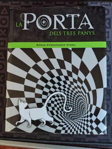 Livro em catalão sobre física quântica. La porta dels tres panys. 