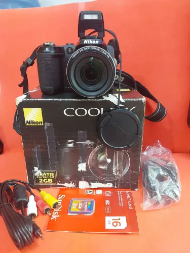 Câmera nikon Coolpix L120 na caixa
