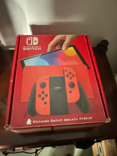 Nintendo switch oled ediaco mario vermelho,cartão 128 gigas já com d.e.s.b.l.o.q.u.e.i.o