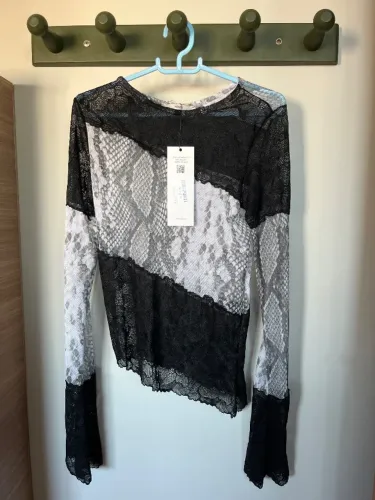 Blusa rendada Mossy