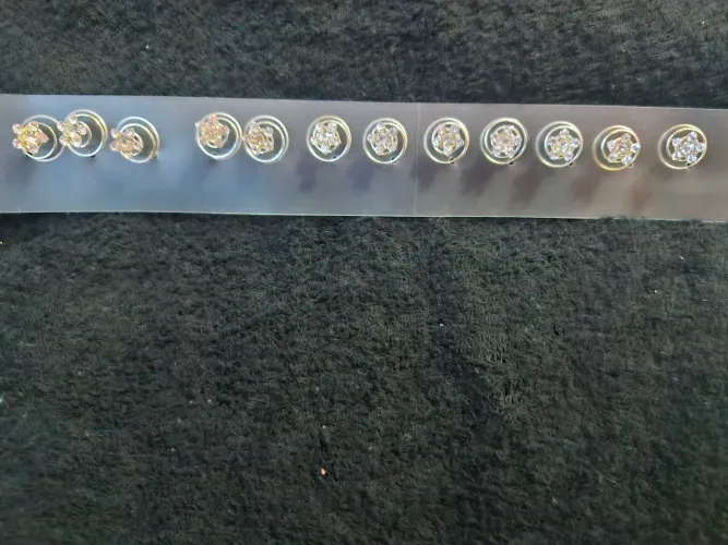 Ponto de luz para cabelos com strass formato estrela