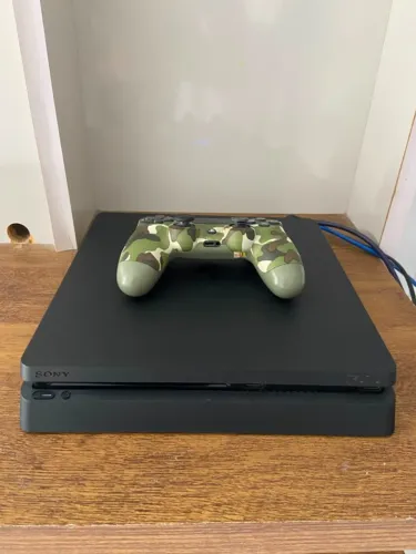 PlayStation 4 - 1TB - 1 Controle + 15 jogos na conta
