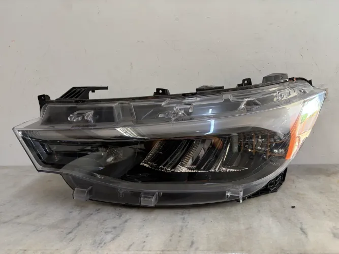 Farol Fastback 2021/2025 original esquerdo 