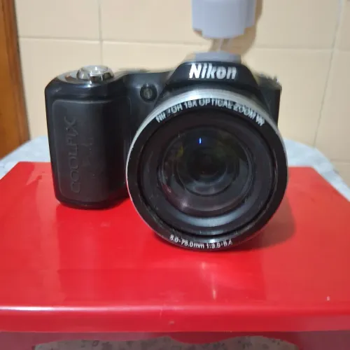 Câmera nikon coolpix L100...Só a câmera.   