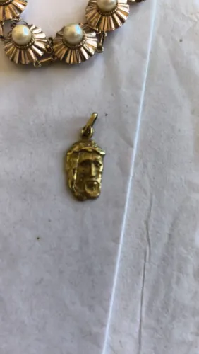 Vendo pingente ouro face de cristo