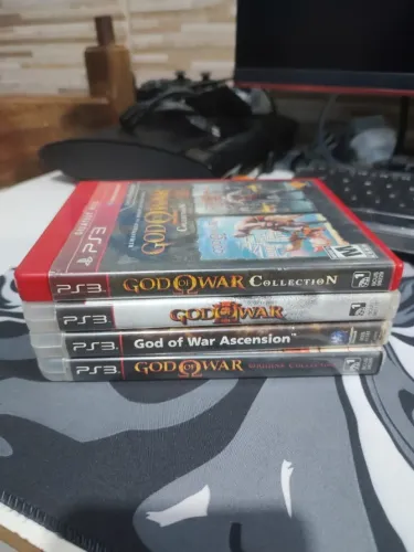 Coleção de jogos God of War para o PS3 completos e sem riscados