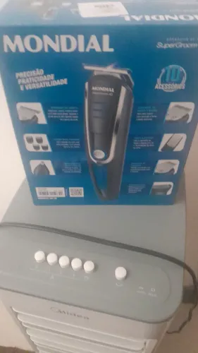 Máquina de barbear e cortar cabelo