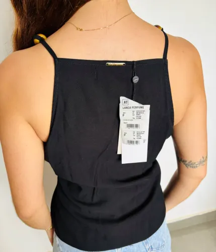 Blusa lança perfume - Nova 