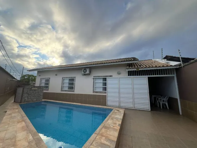 Casa com 3 dormitórios, PISCINA e área gourmet à venda, 154 m² por R$ 1.080.000 - Caiçara 