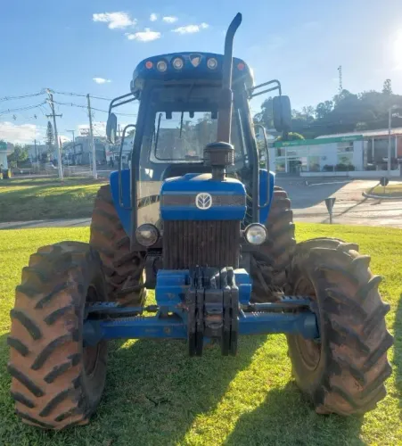 TRATOR NEW HOLLAND, MODELO 7630, COM CABINE, ANO 1998