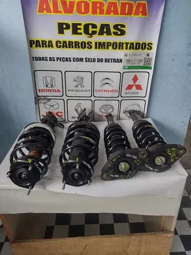 Amortecedor Nissan centra ano 04 05 06 original completo com mola batente