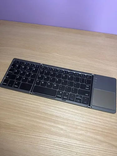 Teclado dobrável Bluetooth com touchpad