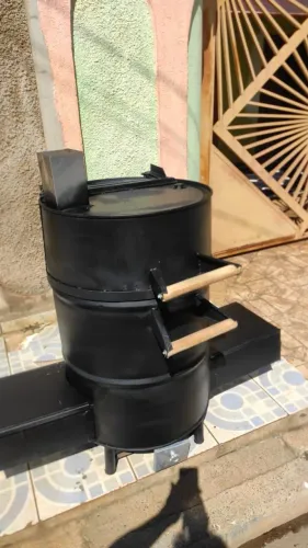 Vendo churrasqueira a bafo pra assar costel?o etc