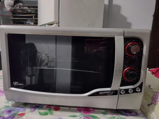 Vendo forno elétrico Fischer 44 litros funciona tudo certinho