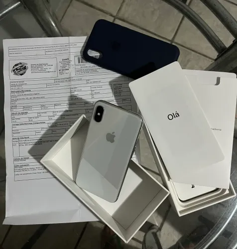 iPhone X com nota e caixa