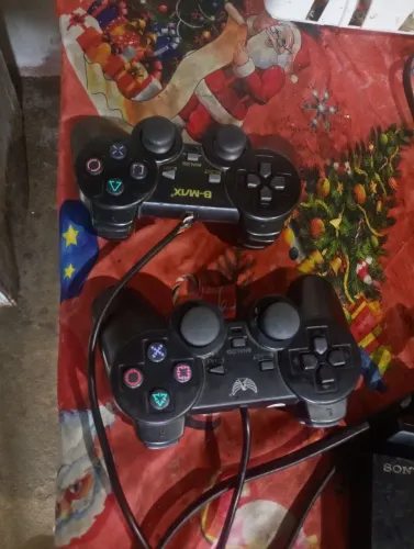 PS2 desbloqueado com 2 controles, aceito troca em iPhone 