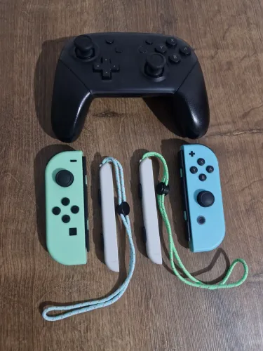 Par Joy-Cons com alcinhas + controle Nintendo switch ( paralelos )
