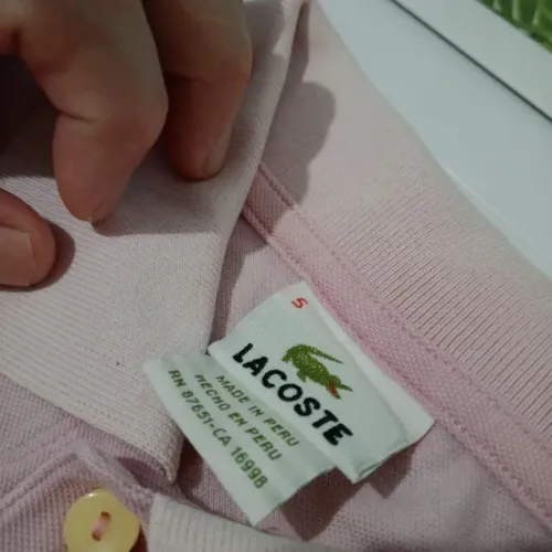 Camisa masculina polo rosa tamanho P da marca Lacoste usada