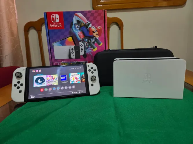 Nintendo Switch OLED Desbloqueado (JV Games - Selo Intacto) + Cartão 256GB