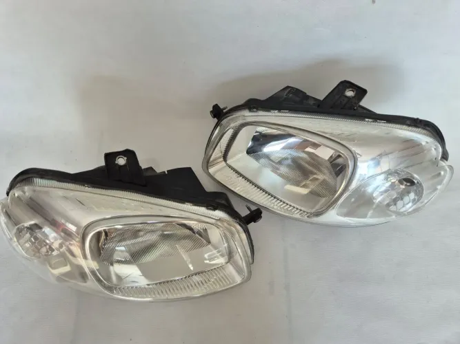 Par de farol Fiat Uno 2011 2012 2013 2014 originais
