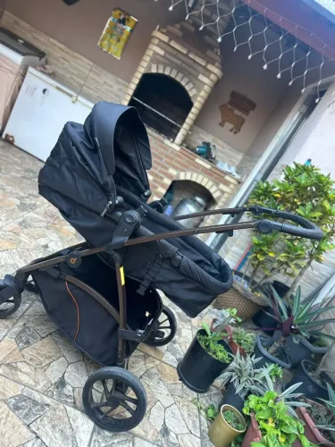 Carrinho de  bebe e acessorios
