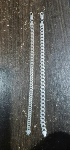 Troco essas 2 pulseiras prata por outra mais grossa