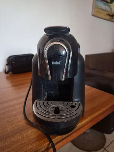 Cafeteira de cápsulas usada