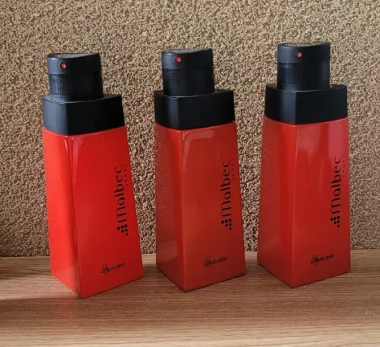 3 frascos vazios de malbec sport. + uma caixa.