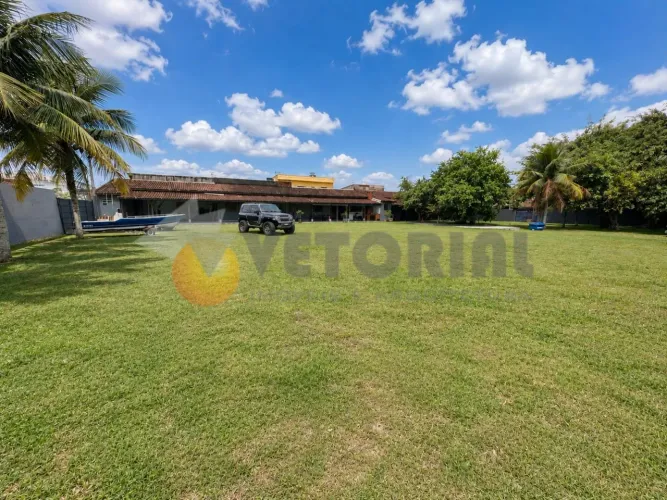 Casa com 4 dormitórios à venda, 428 m² por R$ 1.700.000,00 - Porto Novo - Caraguatatuba/SP