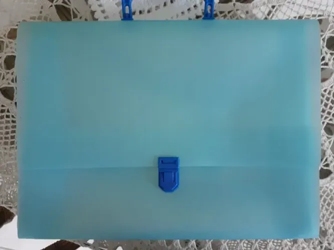PASTA MALETA. AZUL CELESTE.