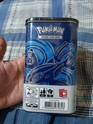 Lata pokémon kyogre e groudon, lacradas, com boosters