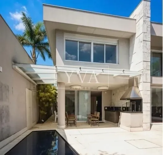 Casa com piscina e área gourmet com 420 m², 4 quartos sendo 2 suítes à venda no bairro Vil