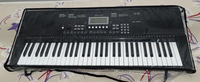 Teclado Musical Revas KB-330 61 teclas sensitivas