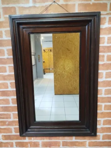 Espelho decorativo com moldura
