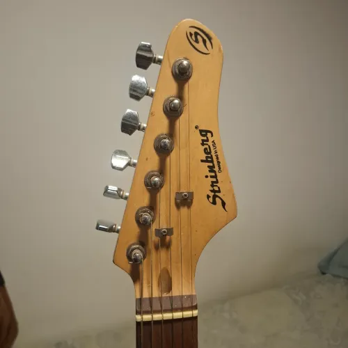 Guitarra e cubo baby