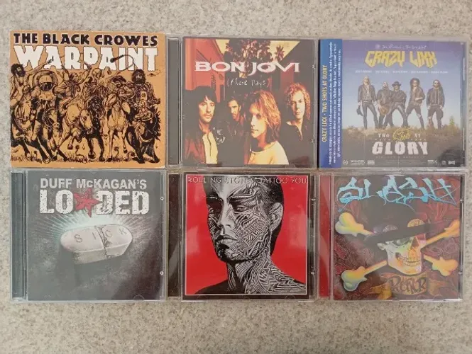 CDs Rock: Black Crowes, Bon Jovi, Crazy Lixx, Duff McKagan, Rolling Stones, Slash.