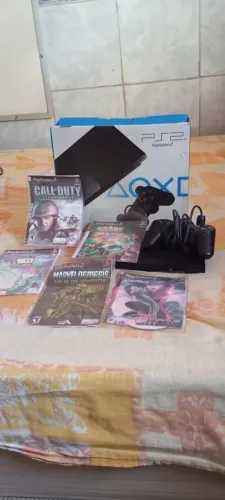 ? PlayStation 2 + Guitarra