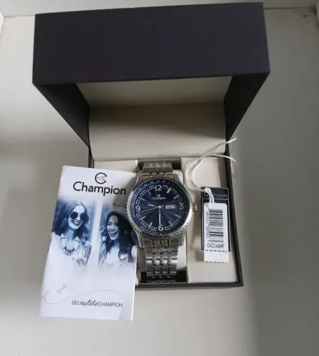 Vendo esse lindo Relógio Champion com estojo e gomo estra !
