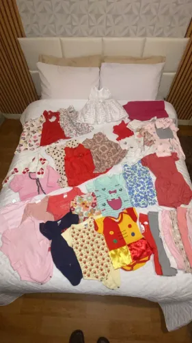 Sacola fechada roupas e itens de bebê menina M e G