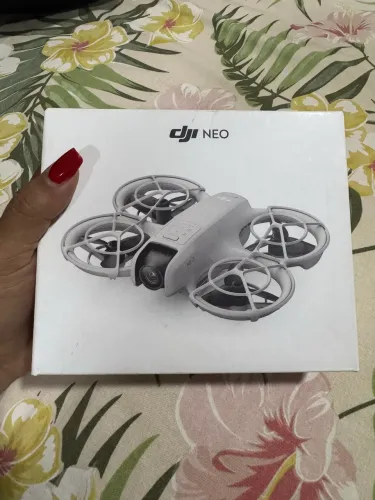 Drone DJI neo novo, fácil instalação e manuseio, Android e App Store, com carregador