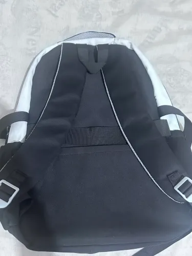 Mochila itabag de gatinho em cores preto e branco