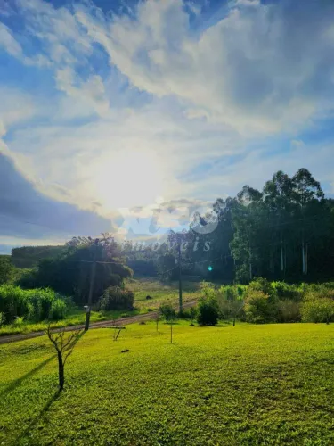 SITIO COM VISTA PARA O POR DO SOL