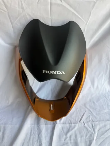 Máscara do farol titan 150 original Honda