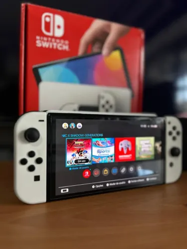 Nintendo Switch OLED Desb. c/ Jogos 