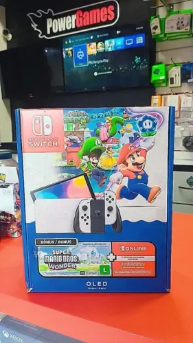 Nintendo Switch Oled + Mario Wonder NOVO