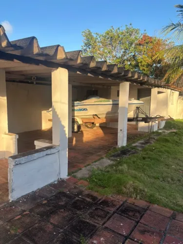Vende-se ou troca uma granja em pium ,com churrasqueira, piscina, fruteiras valor 300 mil
